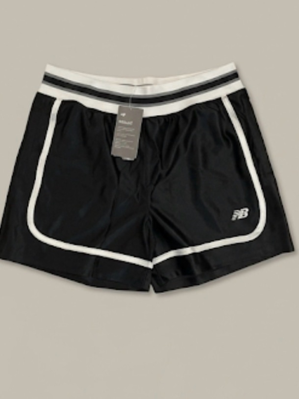 New Balance Black Shorts with White Trim and Striped Waistband